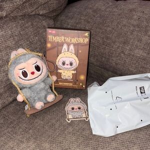 Pop Mart The Monsters Labubu Timber Workshop Playing on the Swing Plush Pendant